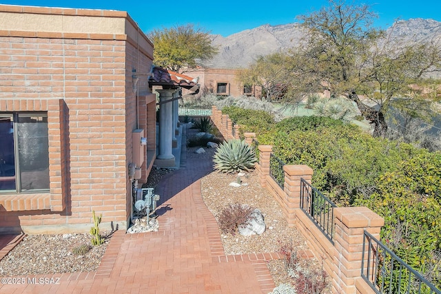 view of patio / terrace with a mountain view