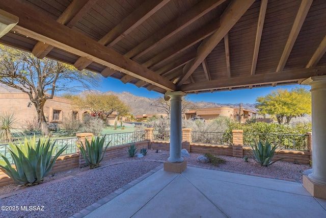 view of patio / terrace with a mountain view