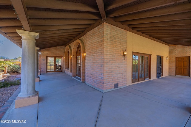 view of patio featuring french doors