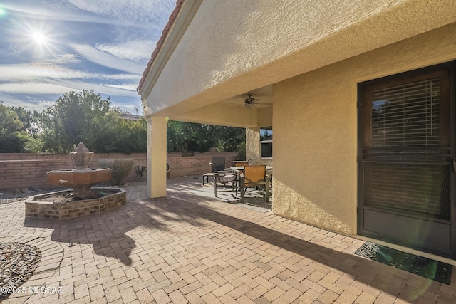 view of patio / terrace with ceiling fan