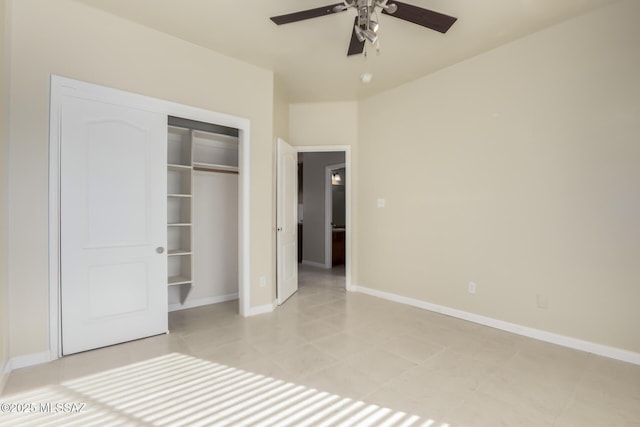 unfurnished bedroom with a closet, ceiling fan, and light tile patterned flooring