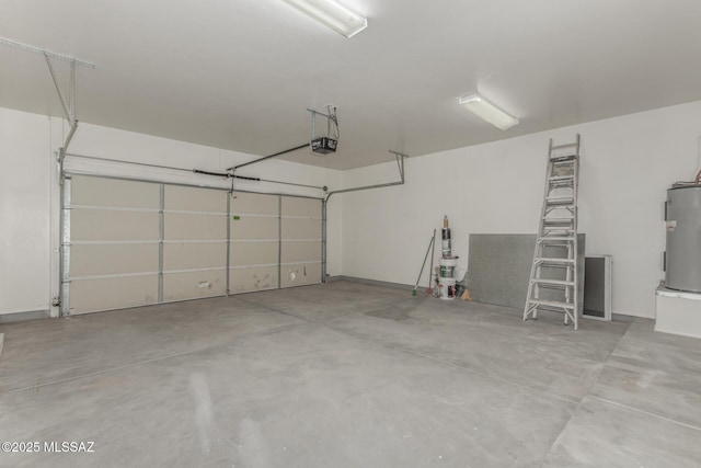 garage with a garage door opener and water heater