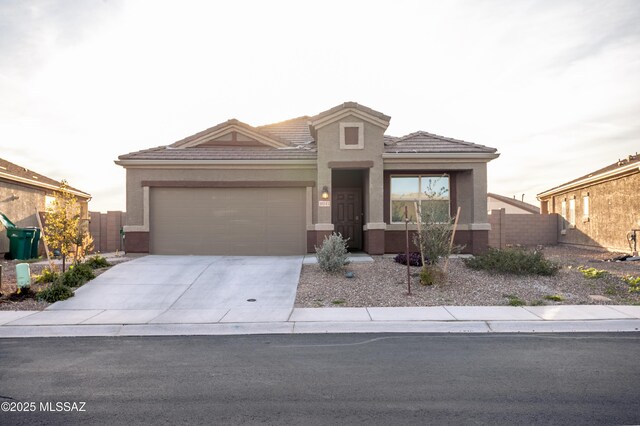 view of front of property featuring a garage