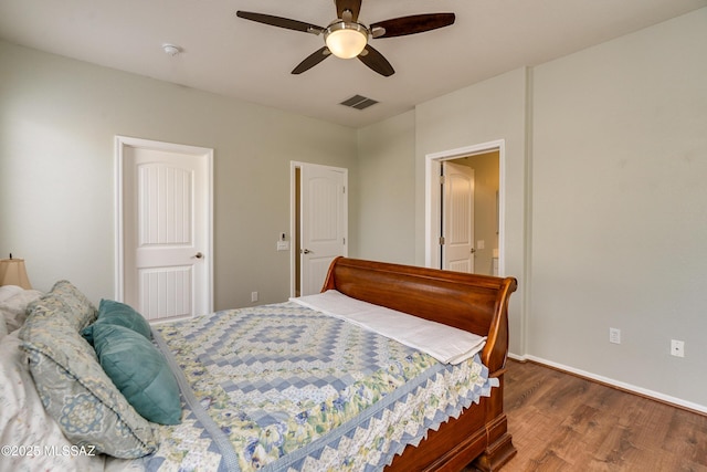 bedroom featuring wood-type flooring and ceiling fan