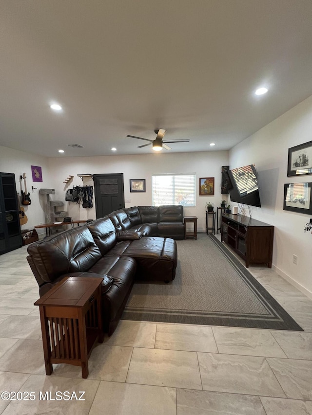 living room with ceiling fan