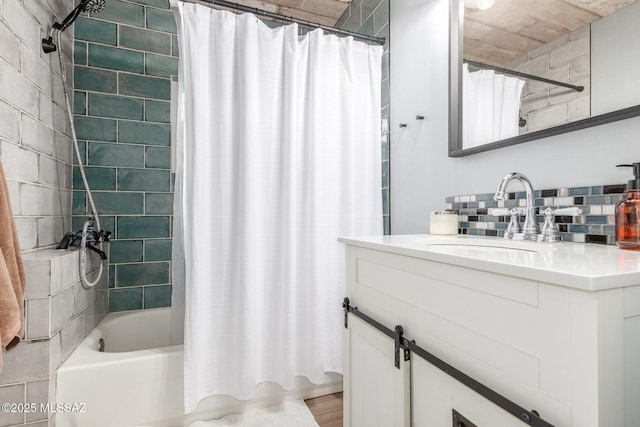 bathroom with vanity, shower / tub combo, and decorative backsplash