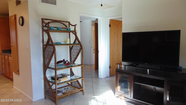 living room featuring light tile patterned flooring