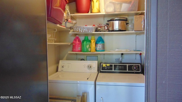 washroom featuring independent washer and dryer