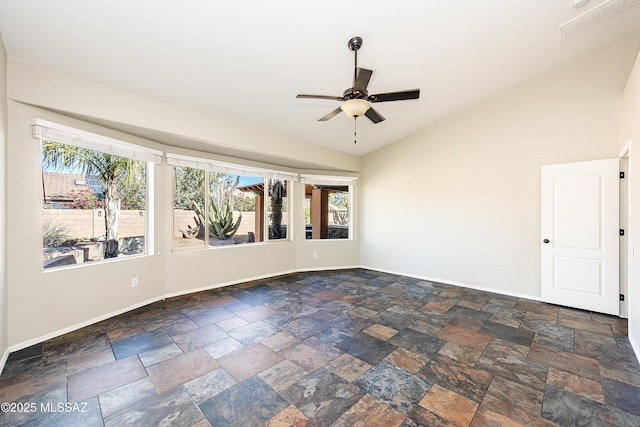 unfurnished room with lofted ceiling and ceiling fan