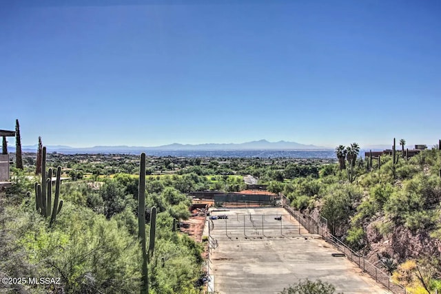 birds eye view of property featuring a mountain view