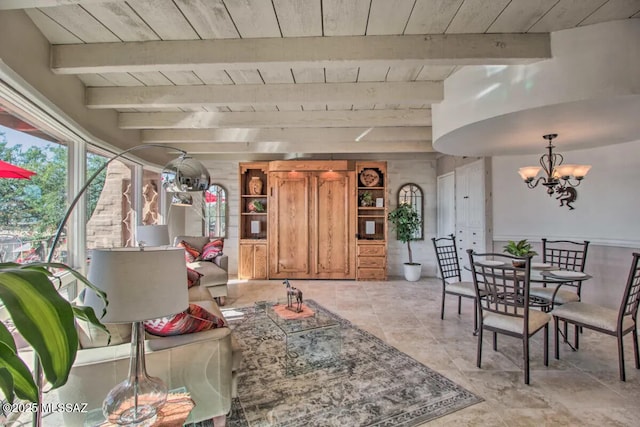 living room featuring an inviting chandelier, wood ceiling, and beam ceiling