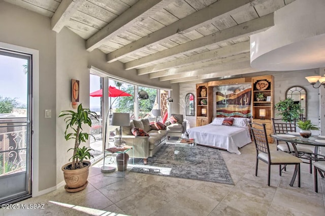 bedroom featuring beamed ceiling and wood ceiling