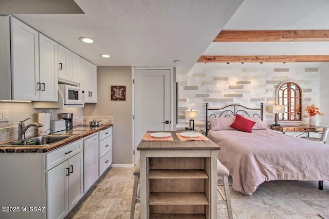 bedroom featuring sink