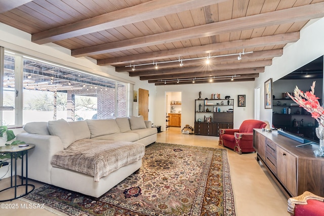 living area with beam ceiling, wooden ceiling, and rail lighting