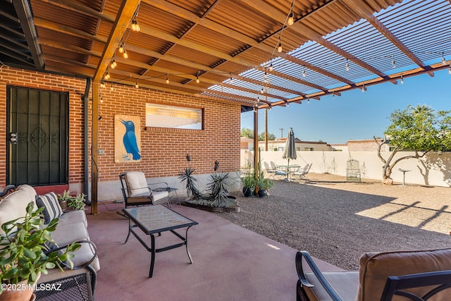 view of patio with outdoor lounge area and a pergola