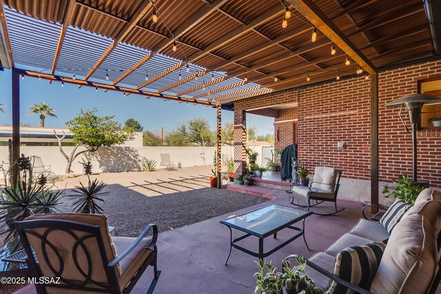 view of patio / terrace featuring an outdoor living space and a pergola