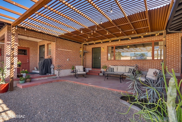 view of patio with an outdoor living space, entry steps, and a pergola