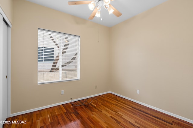 unfurnished room featuring hardwood / wood-style flooring and ceiling fan