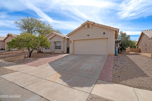 view of front of property featuring a garage