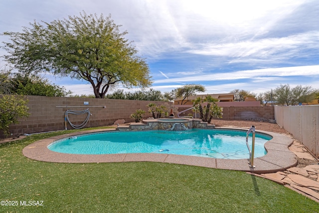 view of pool featuring an in ground hot tub and a yard