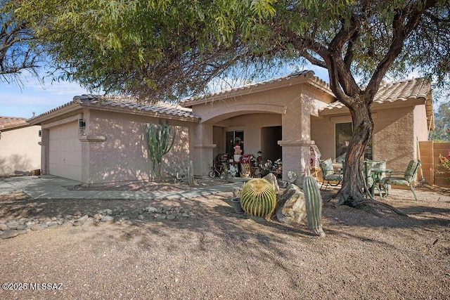 view of front of property with a garage