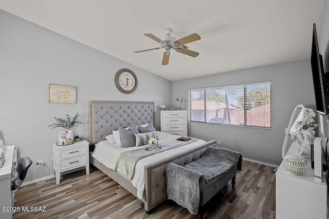 bedroom with hardwood / wood-style flooring and ceiling fan