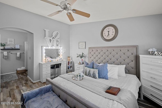 bedroom featuring hardwood / wood-style floors and ceiling fan