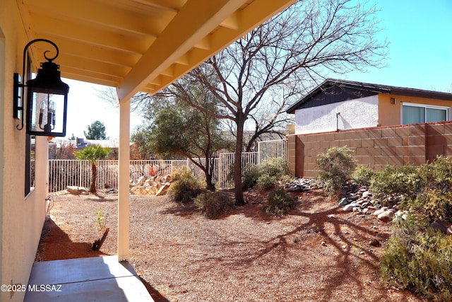 view of yard featuring a fenced backyard