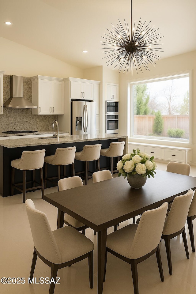 57 Highland Cir, Rio Rico, AZ 85648 - dining room featuring a chandelier and recessed lighting