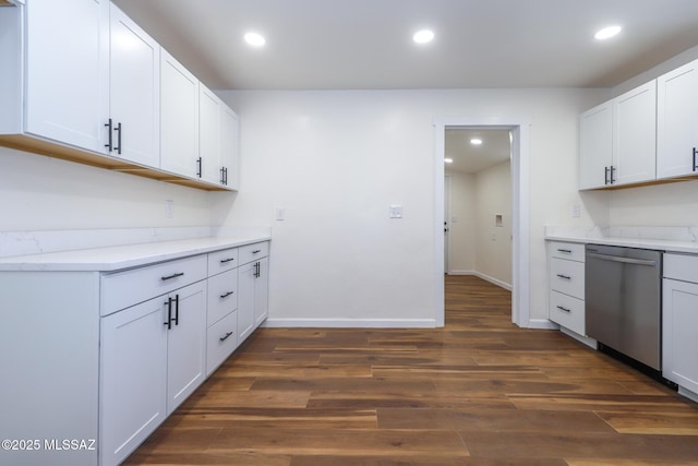 kitchen featuring dishwasher, white cabinets, and dark hardwood / wood-style flooring