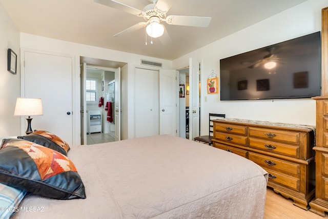 bedroom featuring light hardwood / wood-style flooring and ceiling fan