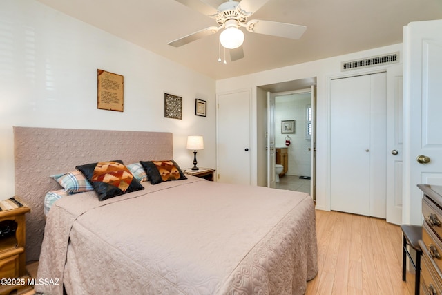 bedroom with ceiling fan and light hardwood / wood-style flooring