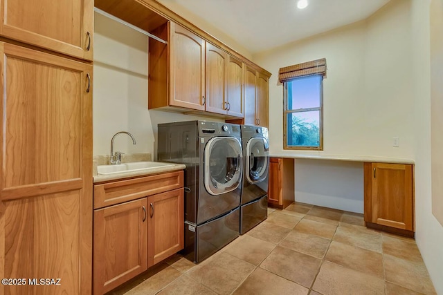 laundry room featuring cabinet space and washer and dryer