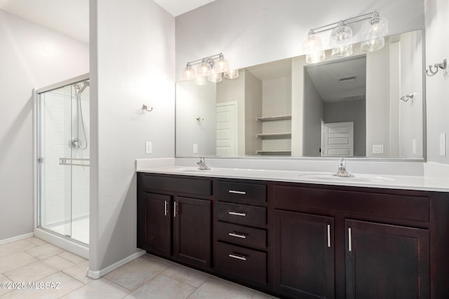 bathroom with walk in shower, tile patterned floors, and vanity