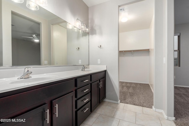 bathroom with vanity, tile patterned floors, and ceiling fan