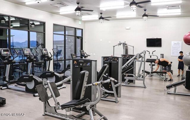 exercise room featuring ceiling fan