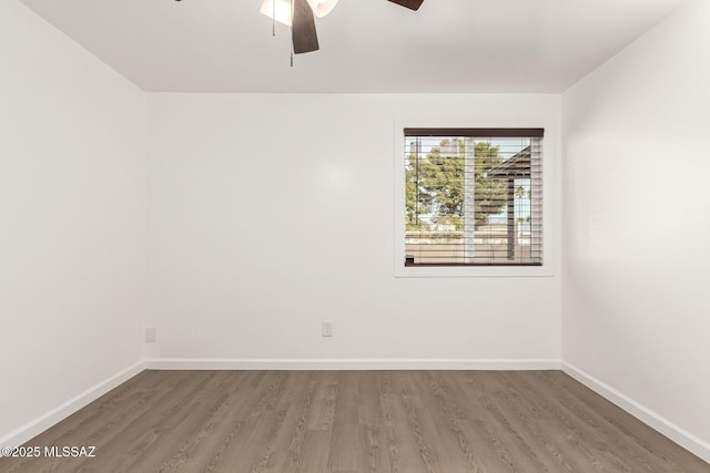 unfurnished room featuring ceiling fan and hardwood / wood-style floors