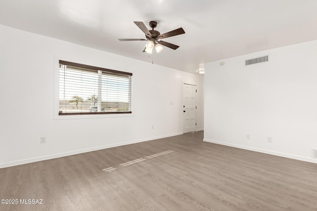 unfurnished room featuring wood-type flooring and ceiling fan