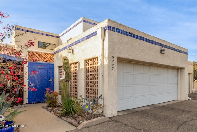 view of side of home with a garage