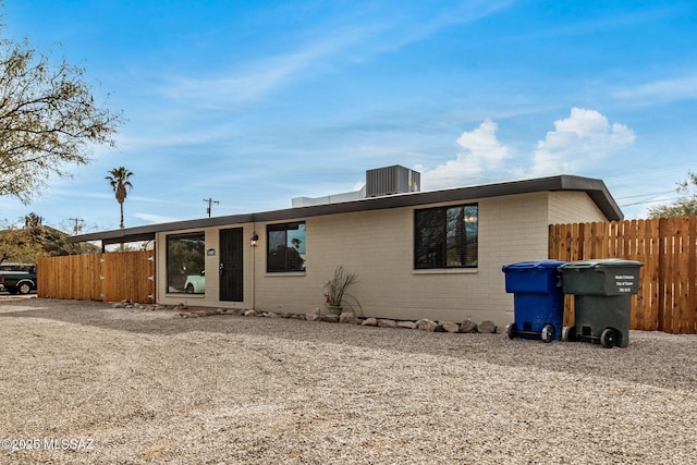 view of front of property featuring cooling unit