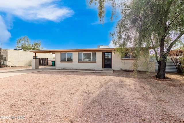 view of front of house with a carport