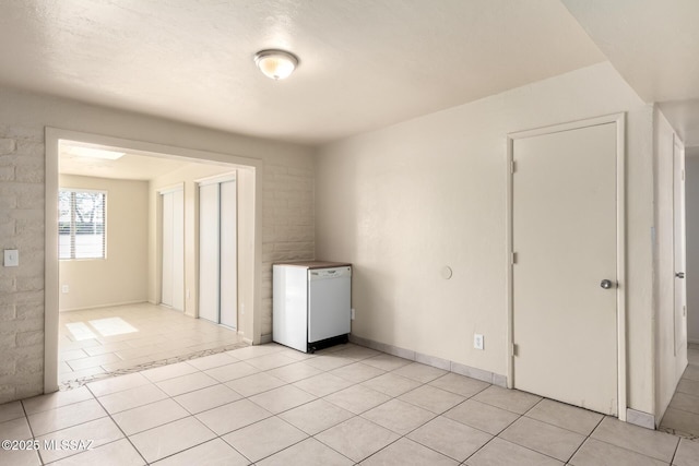 view of tiled spare room