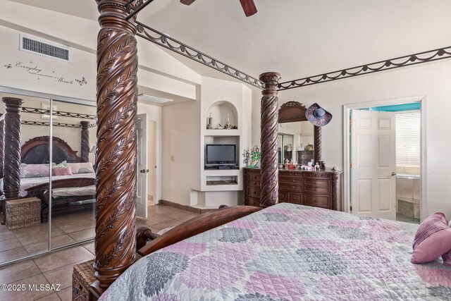 bedroom featuring ceiling fan and light tile patterned floors