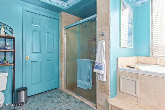 bathroom featuring vanity, vaulted ceiling, and a shower with door