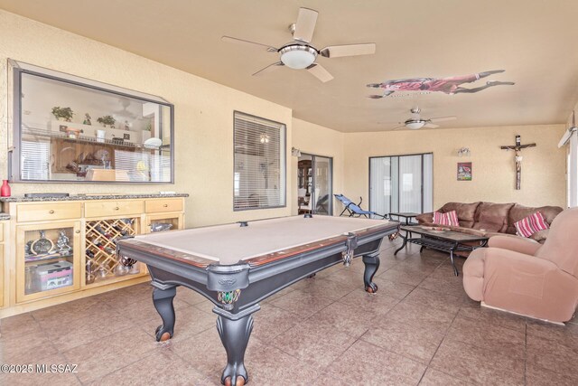 recreation room with ceiling fan and pool table