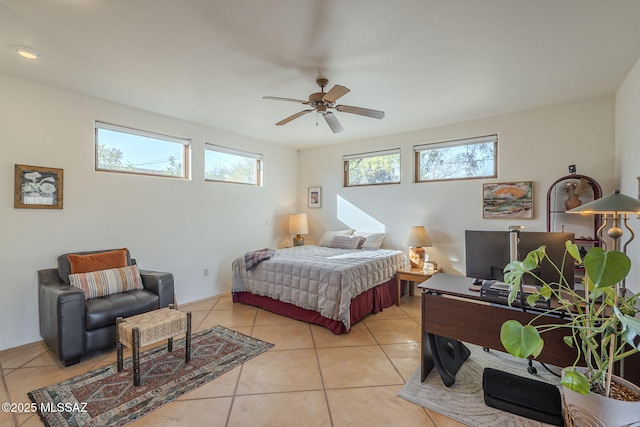 bedroom with light tile patterned flooring and ceiling fan