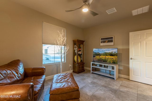 living room featuring ceiling fan