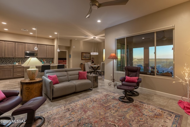 living room with ceiling fan