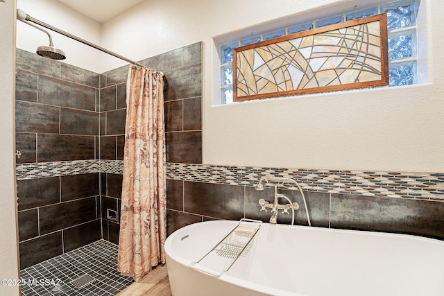 bathroom with hardwood / wood-style flooring and plus walk in shower