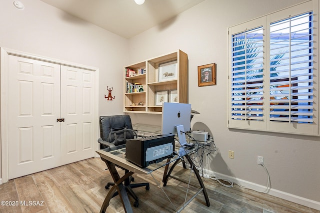 office area with wood-type flooring